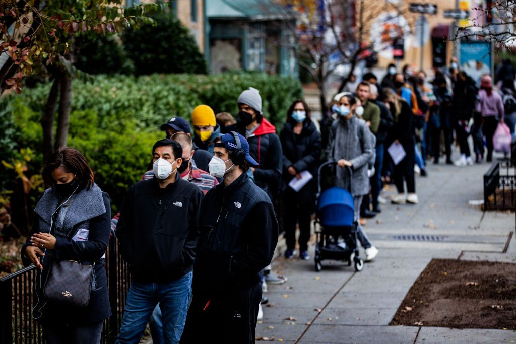 Americans line up for COVID-19 vaccines.