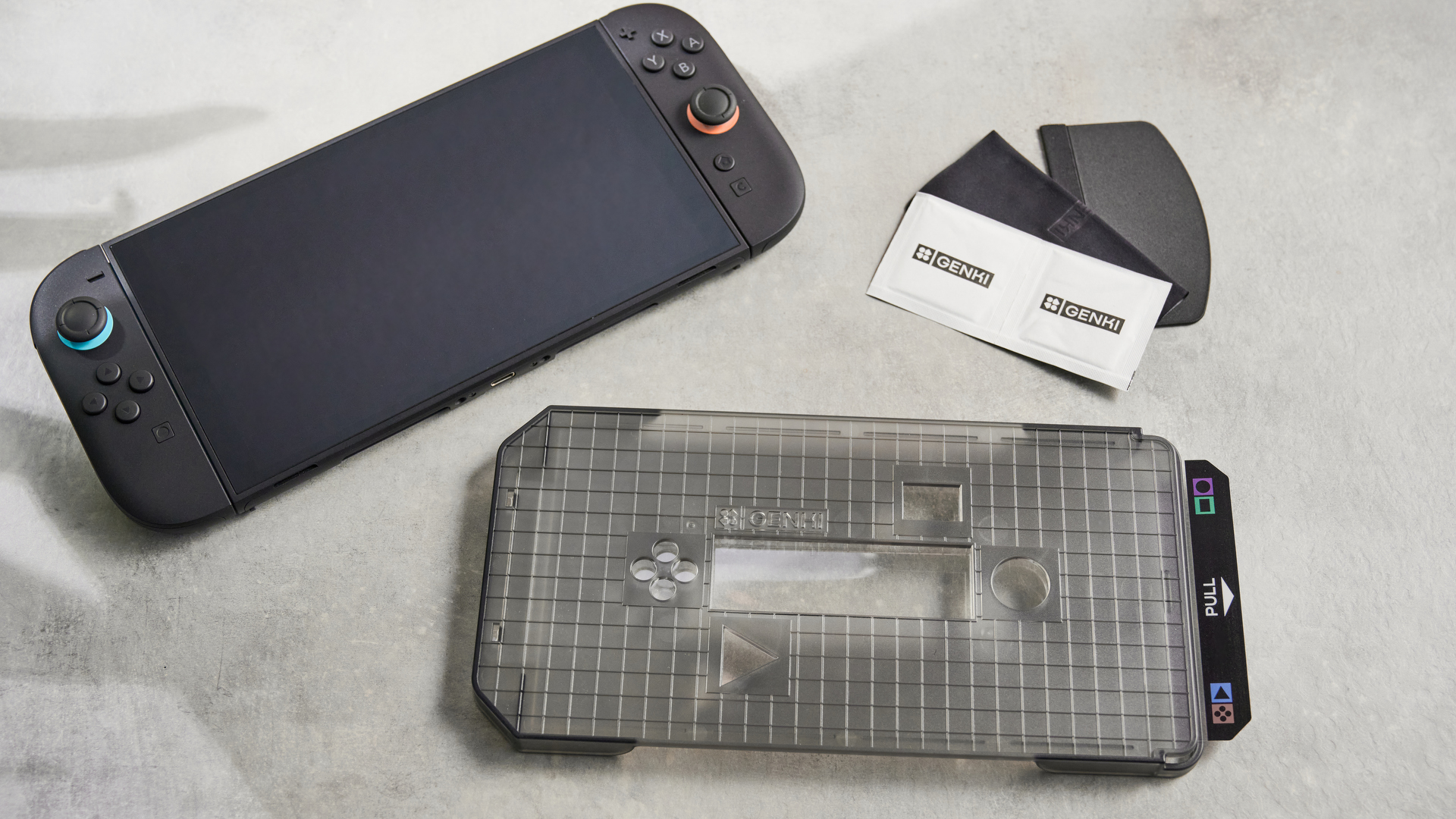 Genki Aegis Shield with Switch 2 console and cleaning tools