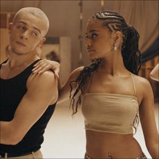 Tyla poses with a dancer in a GAP campaign video while wearing a linen crop top