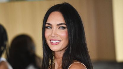 megan fox on a natural wood background