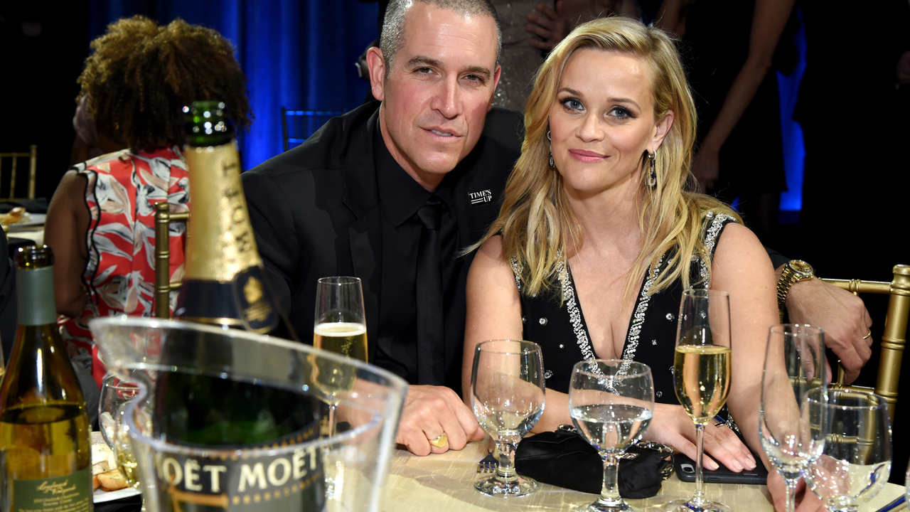 Talent agent Jim Toth (L) and producer-actor Reese Witherspoon attend Moet &amp; Chandon celebrate The 23rd Annual Critics&#039; Choice Awards at Barker Hangar on January 11, 2018 in Santa Monica, California