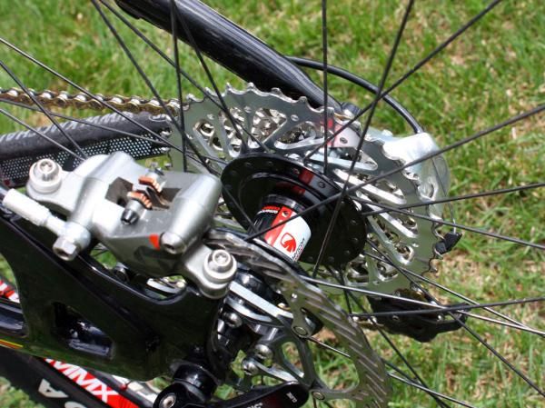 Spoke lacing on the Stan's NoTubes Podium MMX rear wheel is a somewhat unusual one-cross driveside, two-cross non-driveside.