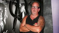 An image of Darrell Sheets in his signature tank top and glasses at an event in 2011.