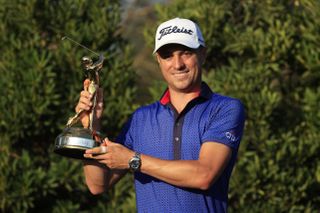 Justin Thomas Holds The Players Championship Trophy