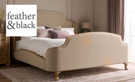 Feather & black's beige bed and bedding