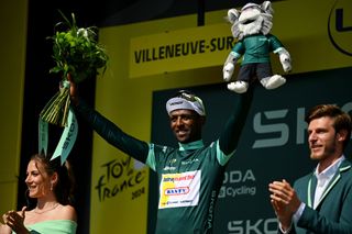 VILLENEUVESURLOT FRANCE JULY 11 Biniam Girmay of Eritrea and Team Intermarche Wanty Green Sprint Jersey celebrates at podium during the 111th Tour de France 2024 Stage 12 a 2036km stage from Aurillac to VilleneuvesurLot UCIWT on July 11 2024 in VilleneuvesurLot France Photo by Dario BelingheriGetty Images