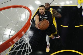Stephen Curry and LeBron James in Game 1 of 2023 NBA Western Conference Semifinal