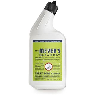 A white bottle of Mrs. Meyer's Clean Day Liquid Toilet Bowl Cleaner with a green label with navy text and a black cap