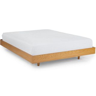 A platform bed made from oak