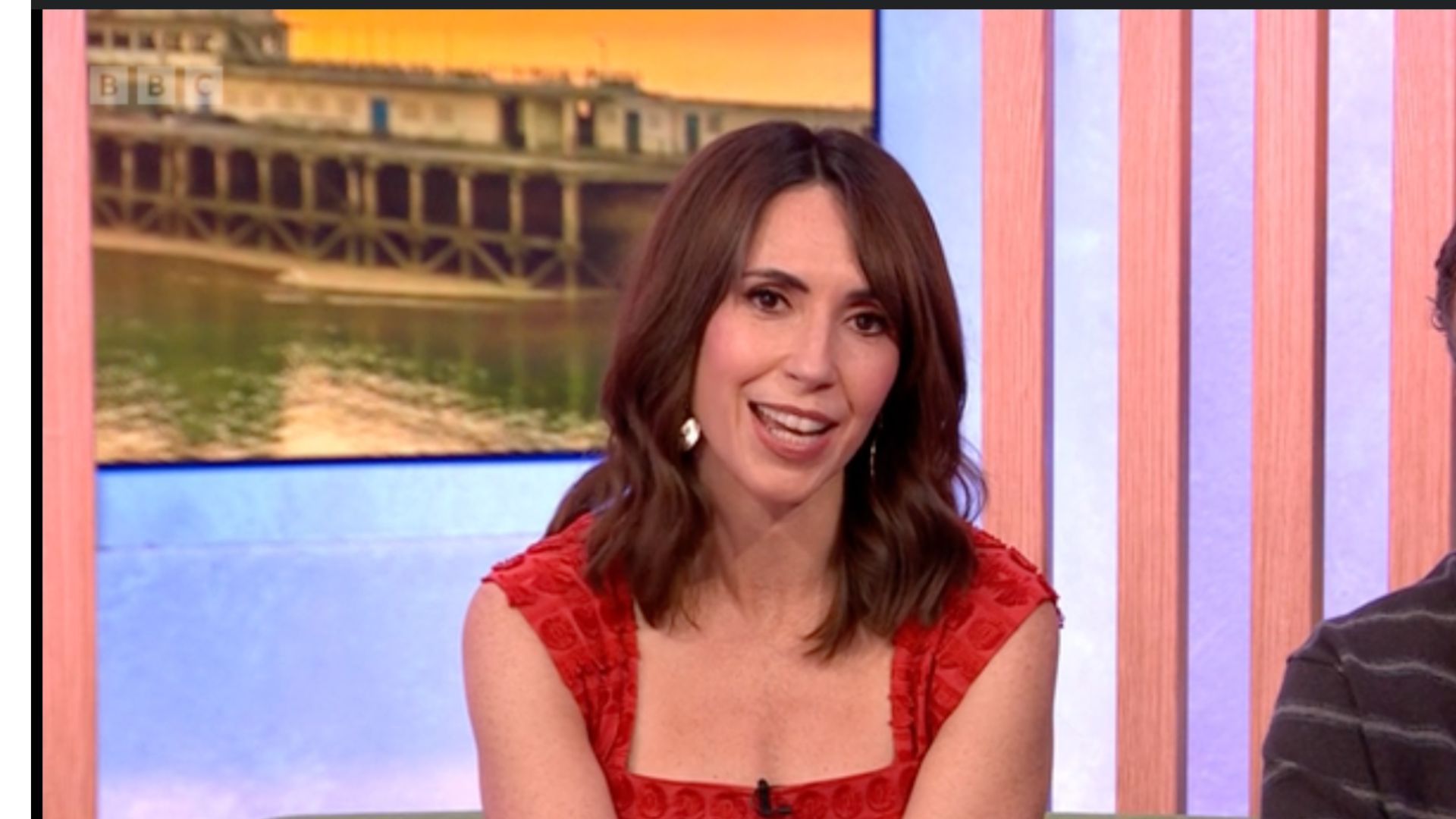 Not pastel, not brights, Alex Jones’s dark, zesty orange dress is a lesson in embracing colour with elegance this summer