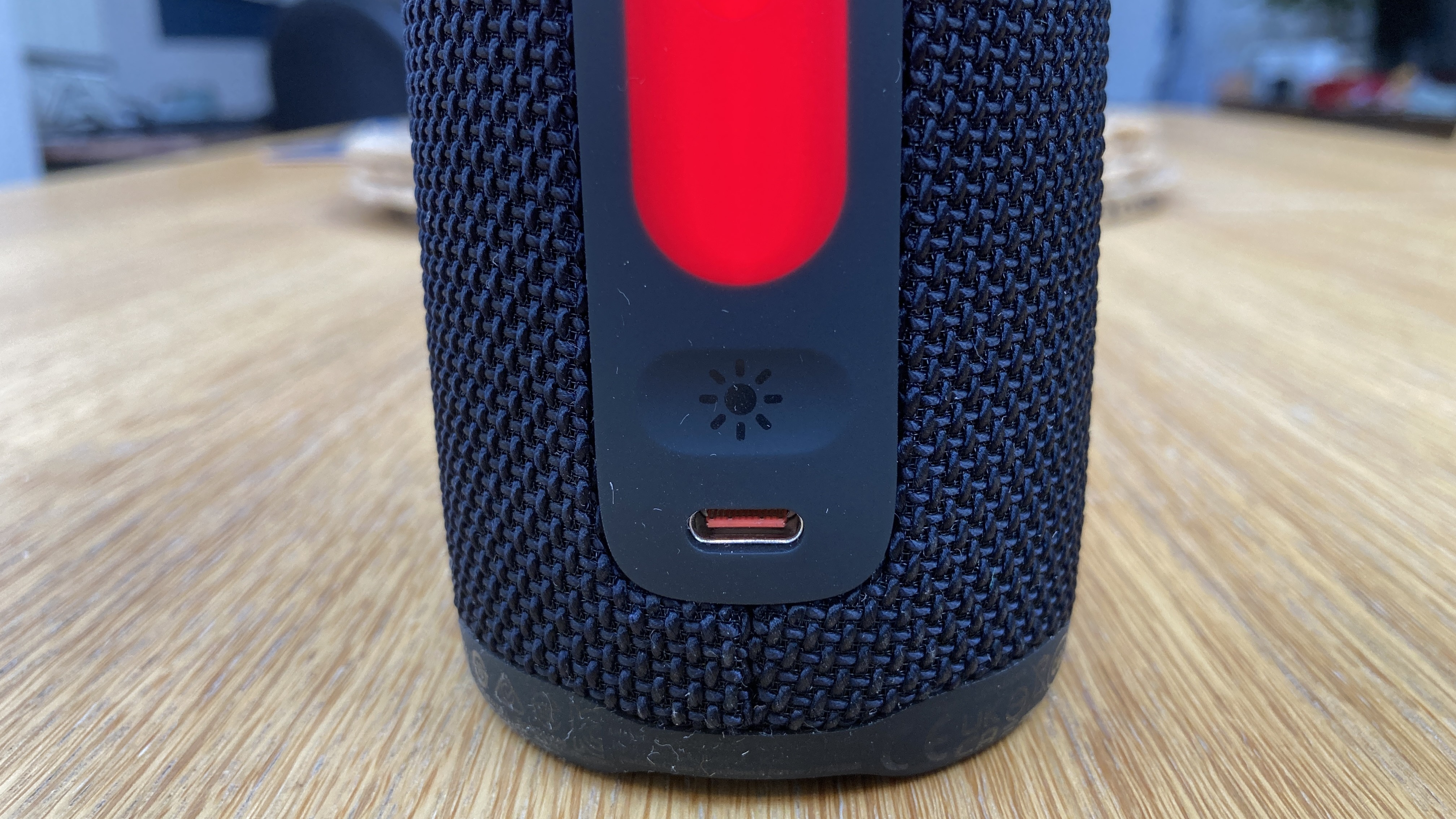 Close up of the JBL Grip's charging port