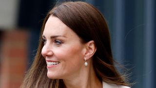 Close-up look at Catherine, Princess of Wales's pearl earrings as she visits the headquarters of the Royal College of Midwives (RCM) and the Royal College of Obstetricians and Gynaecologists (RCOG) on April 27, 2022