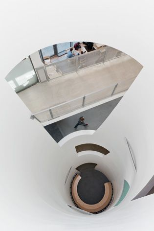 A view from the top of a tunnel designed seating area