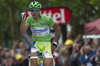 Stage winner Slovakias Peter Sagan R celebrates on the finish line at the end of the 197 km and third stage of the 2012 Tour de France cycling race starting in Orchies and finishing in BoulognesurMer northern France on July 3 2012 The 99th Tour de France to be held from June 30 till July 22 is made up of one prologue and 20 stages and will cover a total distance of 3497 kilometres AFP PHOTO LIONEL BONAVENTURE Photo credit should read LIONEL BONAVENTUREAFPGettyImages