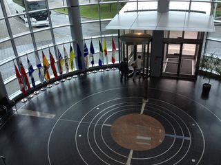 The lobby of the Canadian Space Agency emphasizes international collaboration as well as art that looks a lot like planetary orbits.