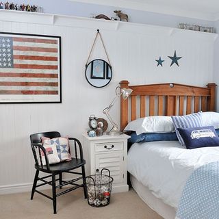 childrens room with wooden bed and white walls