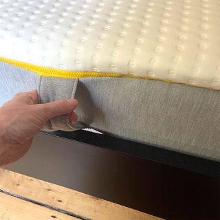 The Eve Wunderflip Lighter Hybrid mattress being tested