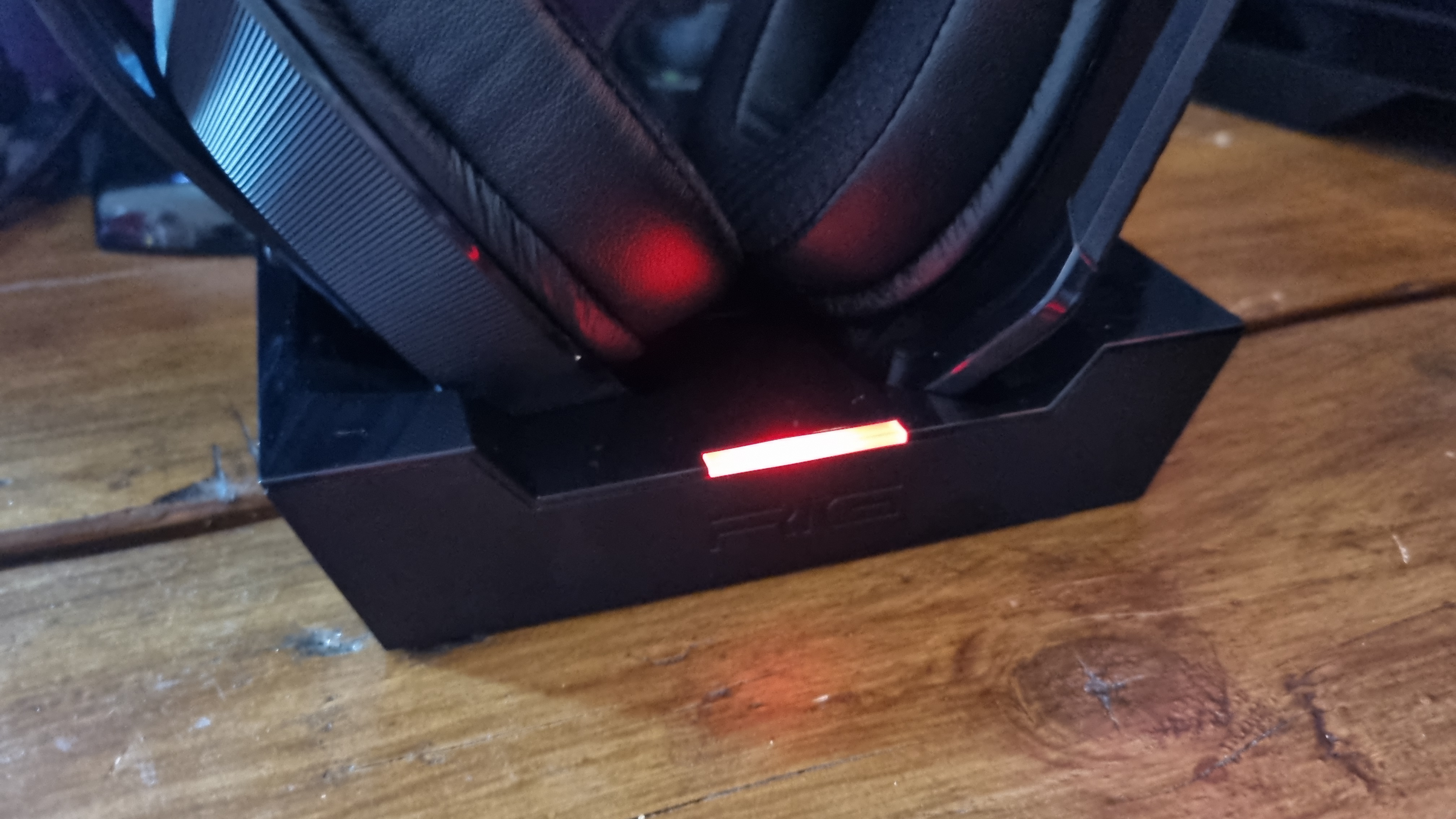 The Nacon RIG 900 Max HS gaming headset with charging cradle