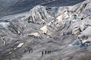 White blankets draped over the Rhone Glacier in the Swiss Alps.