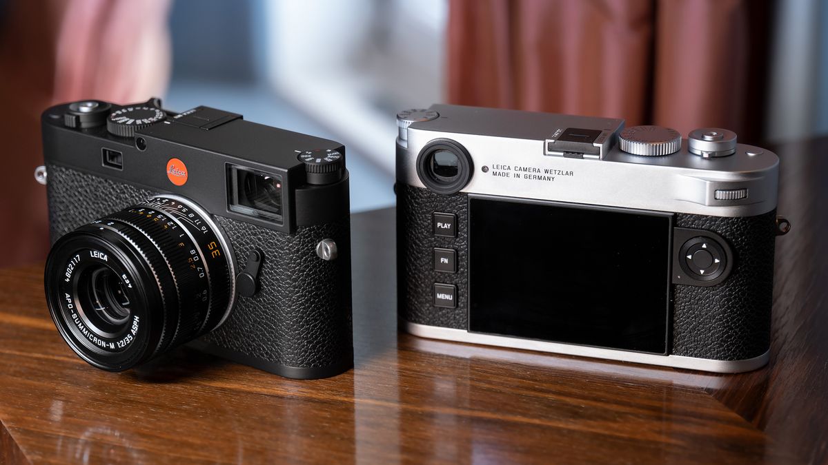 The Leica M11 camera on a wooden table