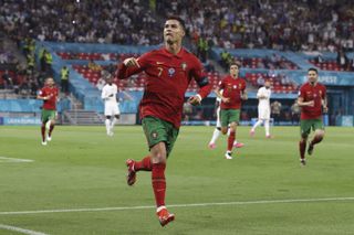 Portugal’s Cristiano Ronaldo celebrates after scoring at Euro 2020