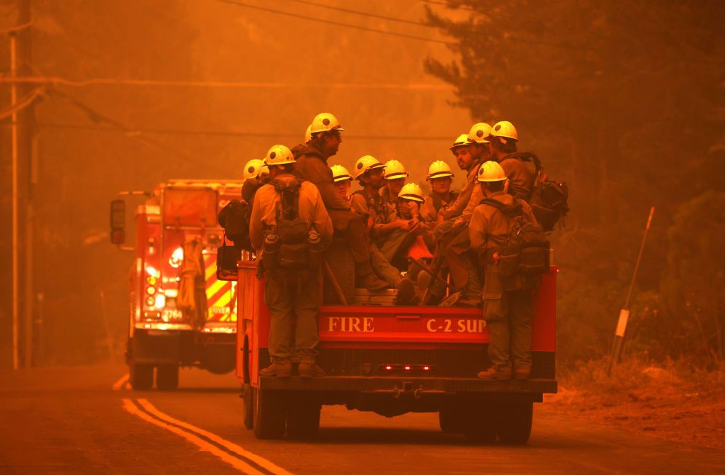 Firefighters battling the Caldor Fire.