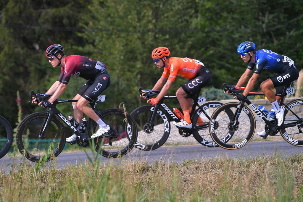 KRAKOW POLAND AUGUST 09 Rohan Dennis of Australia and Team Ineos Patrick Bevin of New Zealand and CCC Team Samuele Battistella of Italy and NTT Pro Cycling Team during the 77th Tour of Poland 2020 Stage 5 a 188km stage from Zakopane to Krakow TourdePologne tdp20 on August 09 2020 in Krakow Poland Photo by Luc ClaessenGetty Images