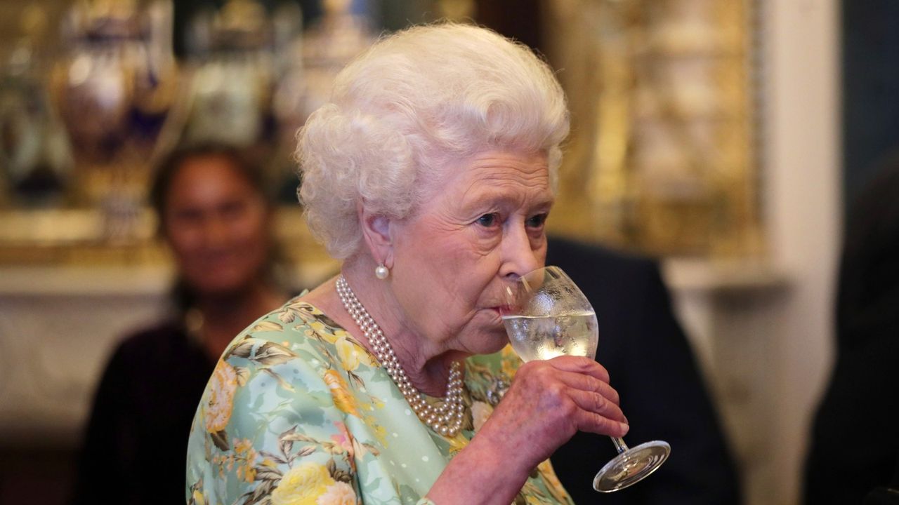 Queen Elizabeth II limited-edition rose petal gin, Queen Elizabeth II attends a reception for winners of The Queen&#039;s Awards for Enterprise, at Buckingham Palace on July 11, 2017 in London, England