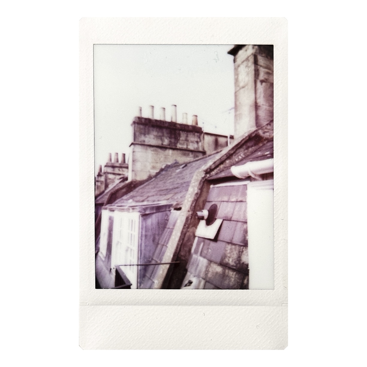 Fujifilm Instax Mini 99 instant print of a building's roof