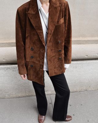 Influencer wearing a suede blazer and loafers