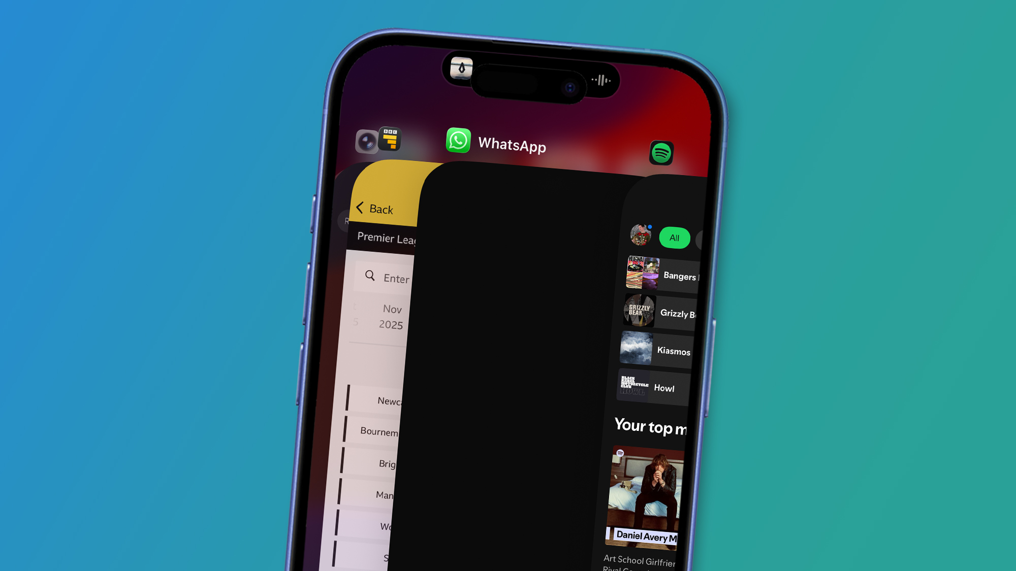 An iPhone on a blue and green background showing iOS apps