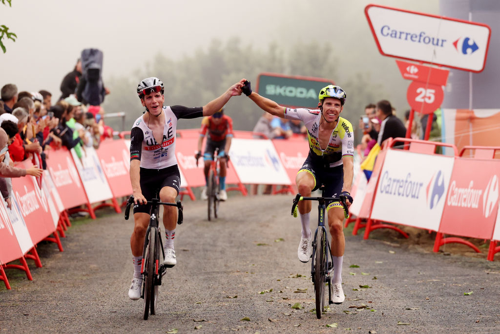 CARAVACA DE LA CRUZ SPAIN SEPTEMBER 03 LR Joo Almeida of Portugal and UAE Team Emirates and Rui Costa of Portugal and Team Intermarche Circus Wanty react after after cross the finish line during the 78th Tour of Spain 2023 Stage 9 a 1845 stage from Cartagena to Collado de la Cruz de Caravaca 1089m UCIWT on September 03 2023 in Collado de la Cruz de Caravaca Spain Photo by Alexander HassensteinGetty Images