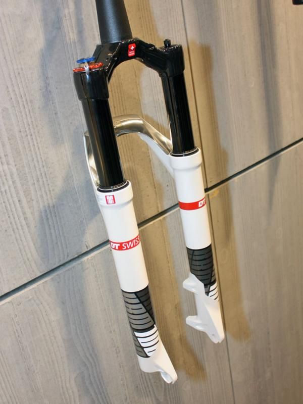 The DT Swiss XRM fork uses magnesium lowers with a unique bonded arch construction for better torsional rigidity than typical C-section designs.