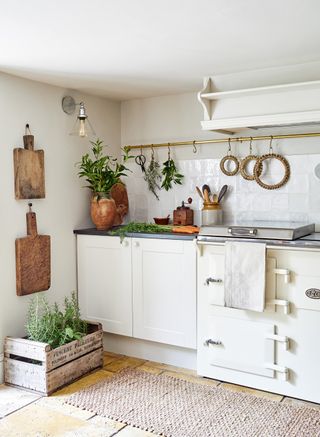 White kitchen with antiques