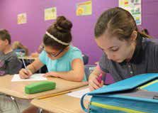 Students at Whitthorne Middle School prepare on the first day of school.