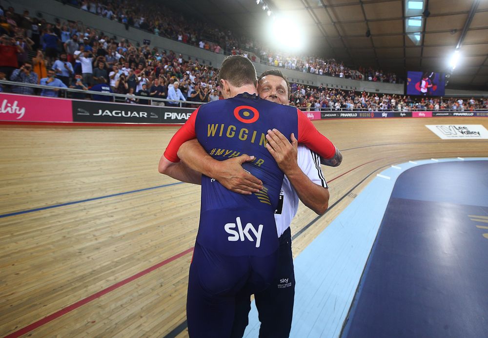 Bradley Wiggins of Great Britain and Team Wiggins is congratulated by coach Heiko Salzwedel after breaking the UCI One Hour Record at Lee Valley Velopark Velodrome.