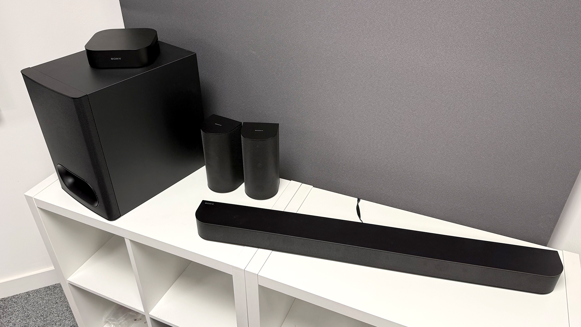 Sony Bravia Theatre System 6 soundbar on white shelving unit