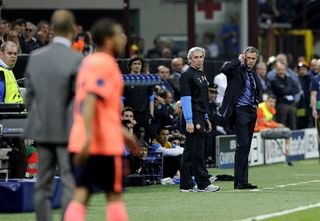 Inter Milan Head Coach Jose Mourinho and Barcelona Head Coach Josep Guardiola during the UEFA Champions League Semi Final First Leg match between Inter Milan and Barcelona at Giuseppe Meazza Stadium on April 20, 2010 in Milan, Italy.