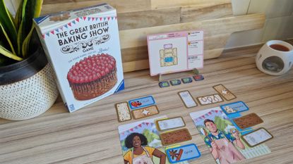 The Great British Baking Show Game laid out in a kitchen