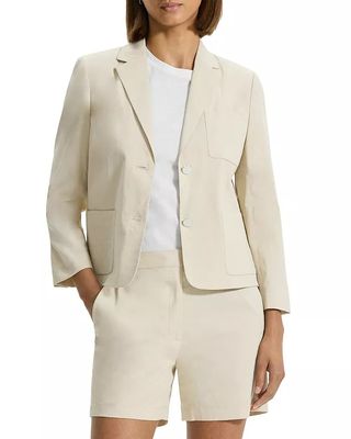 Model wearing beige blazer