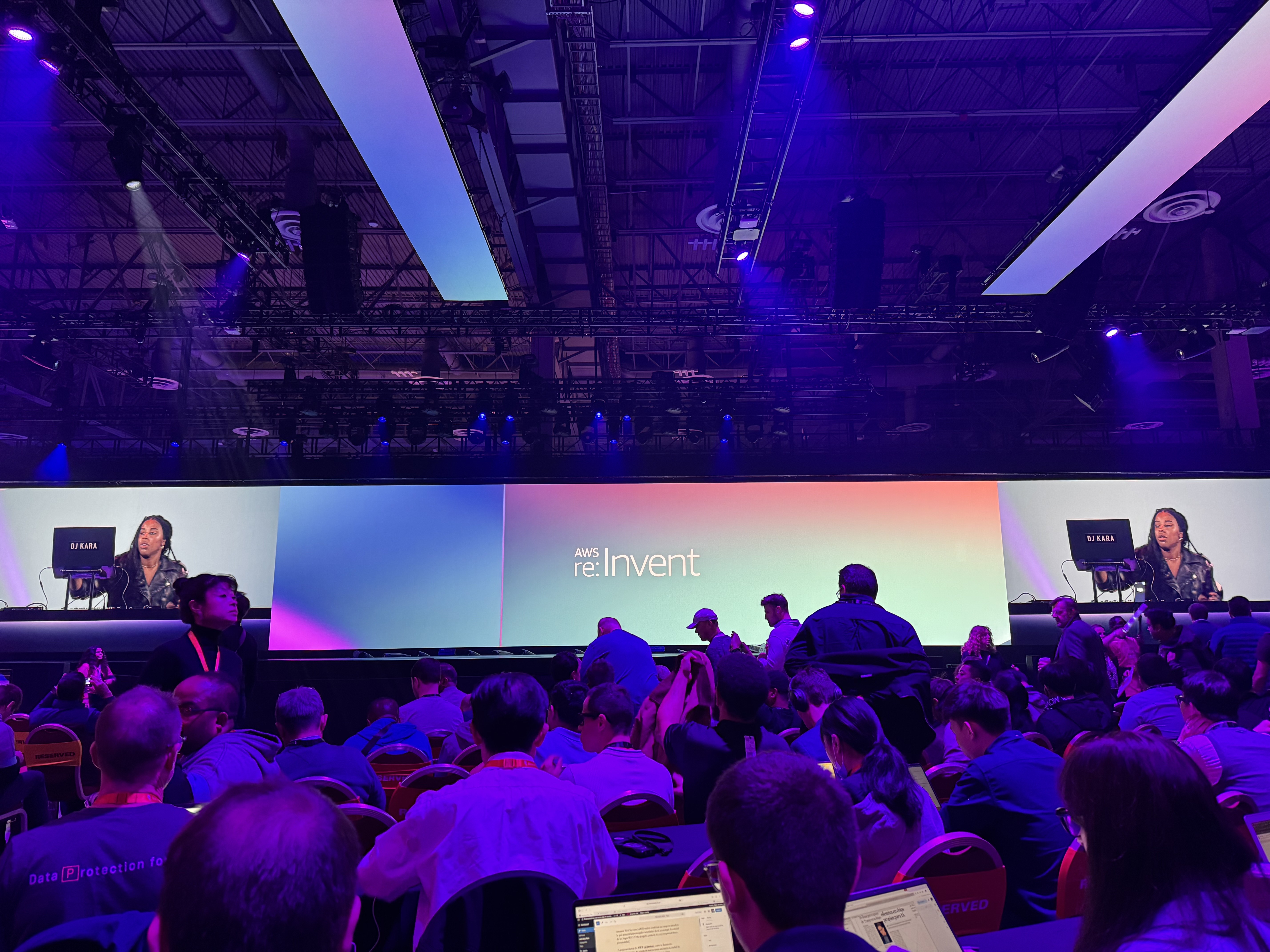 AWS re:Invent logo and branding pictured on stage at the annual conference at the Venetian Hotel, Las Vegas.