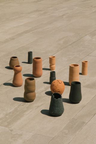 Ceramic vessels in natural clay and black