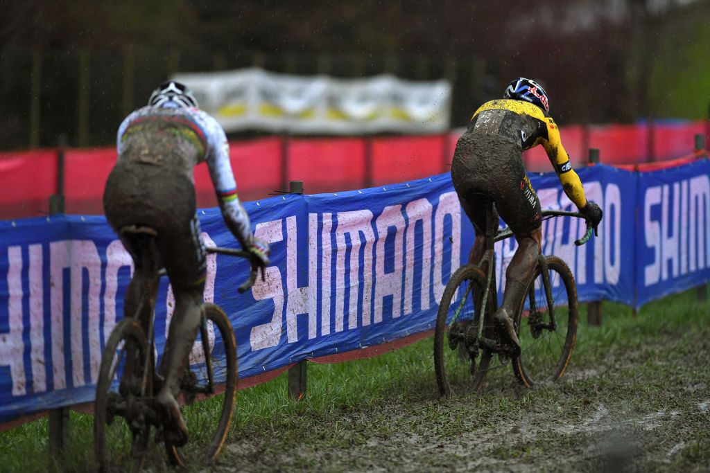DENDERMONDE BELGIUM DECEMBER 27 Mathieu Van Der Poel of The Netherlands and Team Alpecin Fenix Wout Van Aert of Belgium and Team Jumbo Visma Mud during the 1st Dendermonde World Cup 2020 Men Elite dendermonde CXWorldCup UCICyclocrossWC Cyclocross on December 27 2020 in Dendermonde Belgium Photo by Luc ClaessenGetty Images