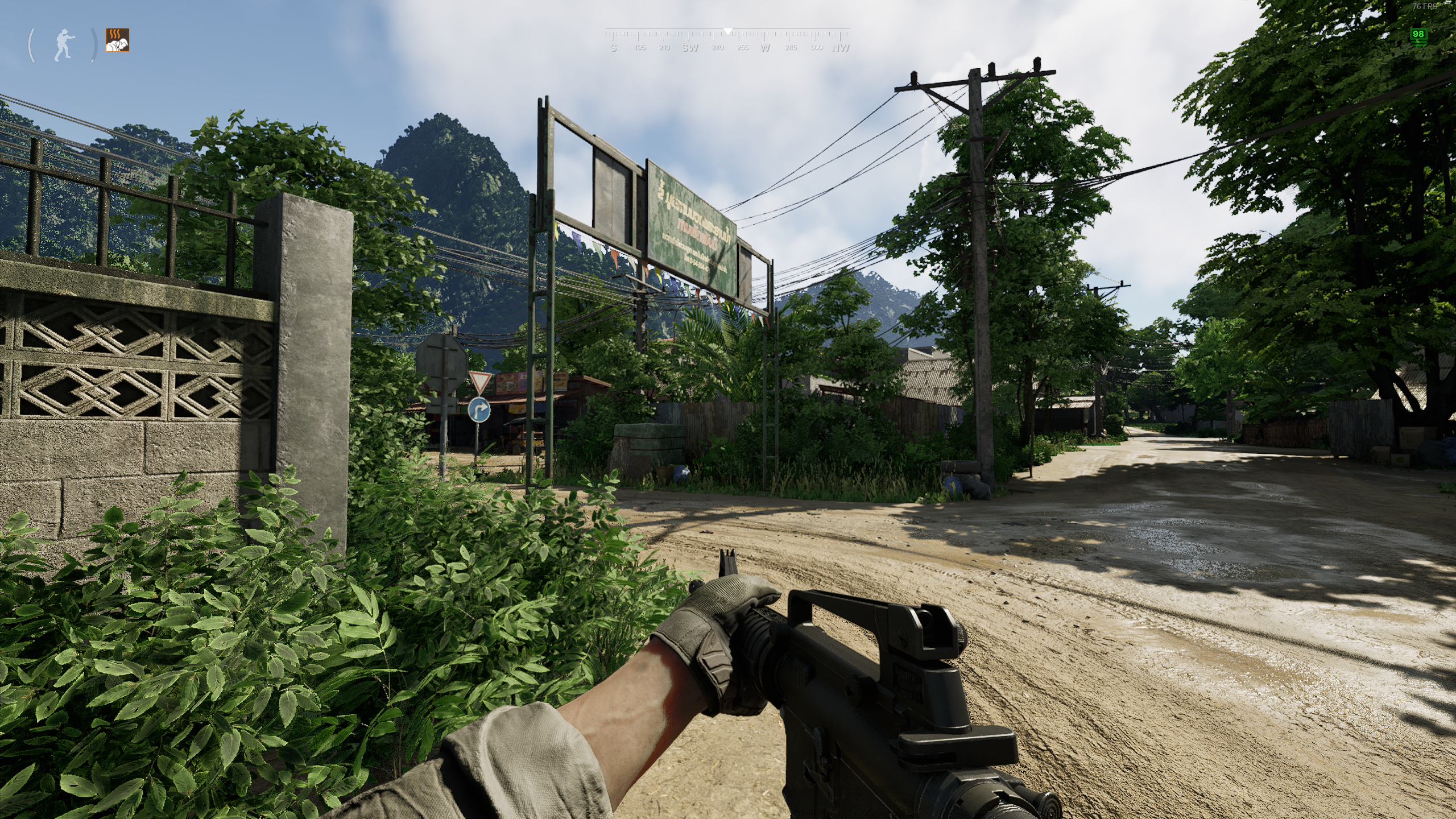 A screenshot from Gray Zone Warfare, showing the player standing outside a village entrance