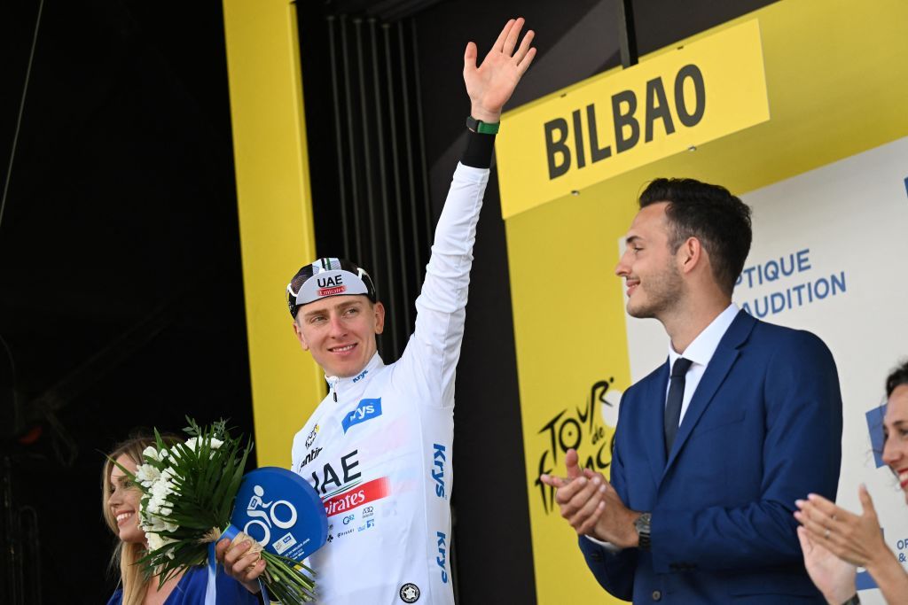 Slovenian Tadej Pogacar of UAE Team Emirates celebrates in the white jersey for best young rider after the first stage of the Tour de France cycling race a 182 km race from Bilbao to Bilbao Spain Saturday 01 July 2023 This years Tour de France takes place from 01 to 23 July 2023 BELGA PHOTO JASPER JACOBS Photo by JASPER JACOBS BELGA MAG Belga via AFP Photo by JASPER JACOBSBELGA MAGAFP via Getty Images