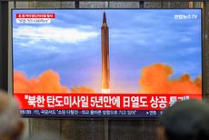 A view of a TV screen on Oct. 4 in which a North Korean missile is being fired. 