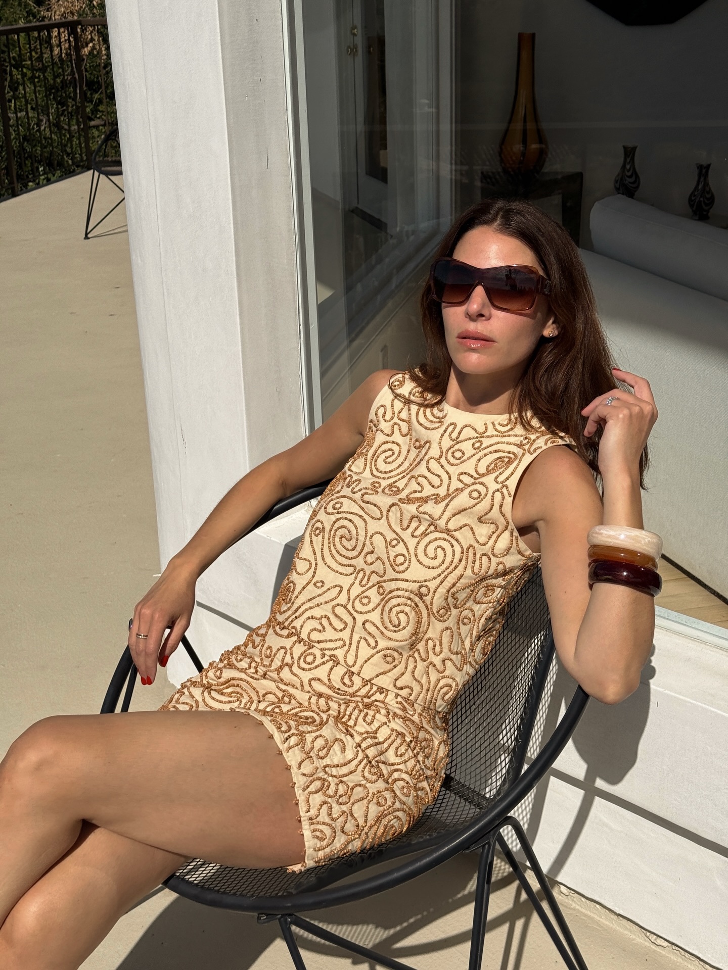 A woman wearing beaded skirt trend for summer 2026.