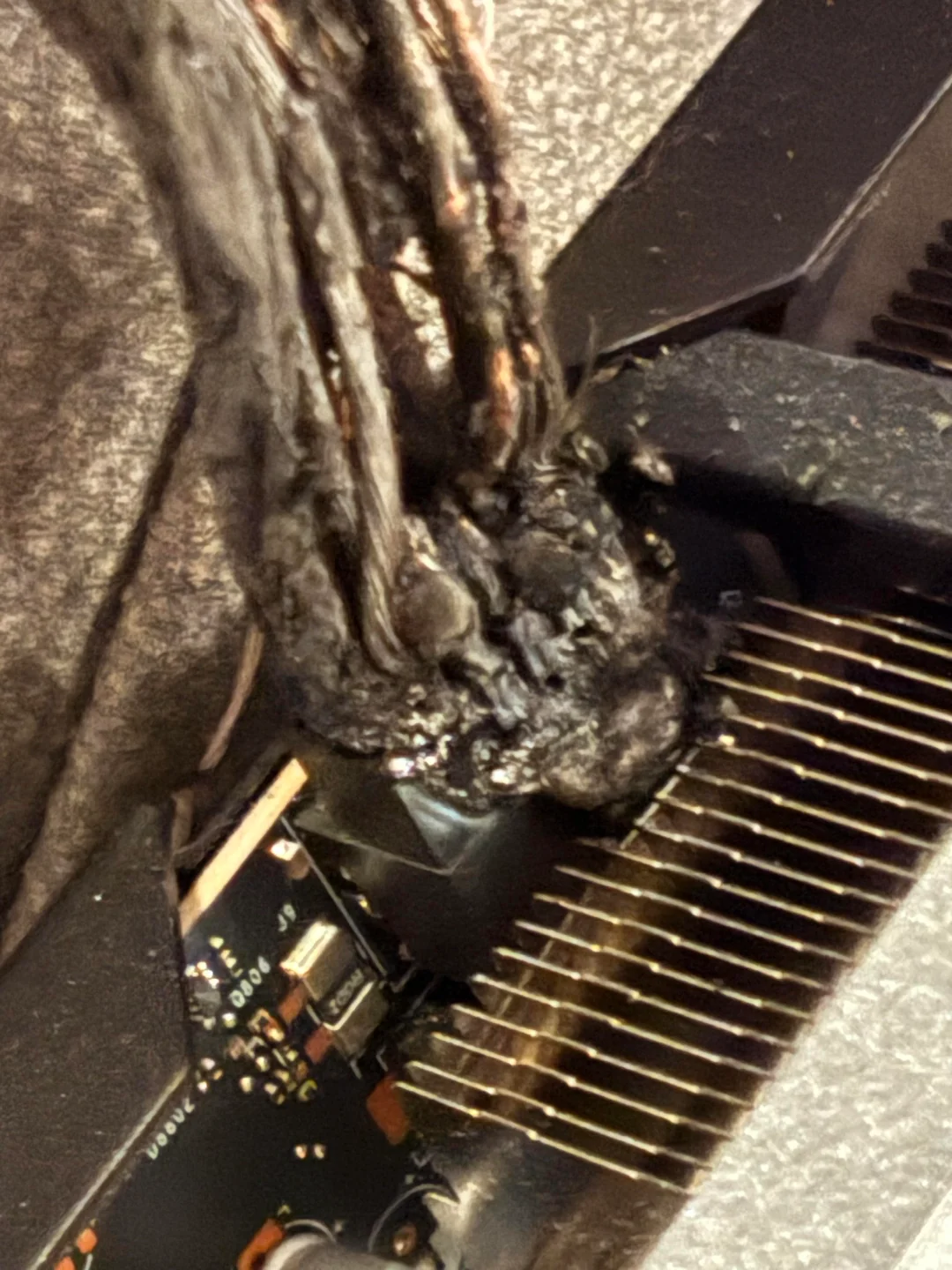 The burnt-down power connector of an RTX 5090