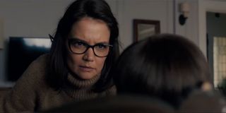 Katie Holmes staring down a doll in Brahms: The Boy 2