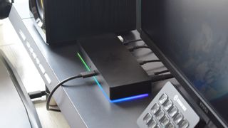 Side profile of the Razer Thunderbolt 4 Dock Chroma in operation.